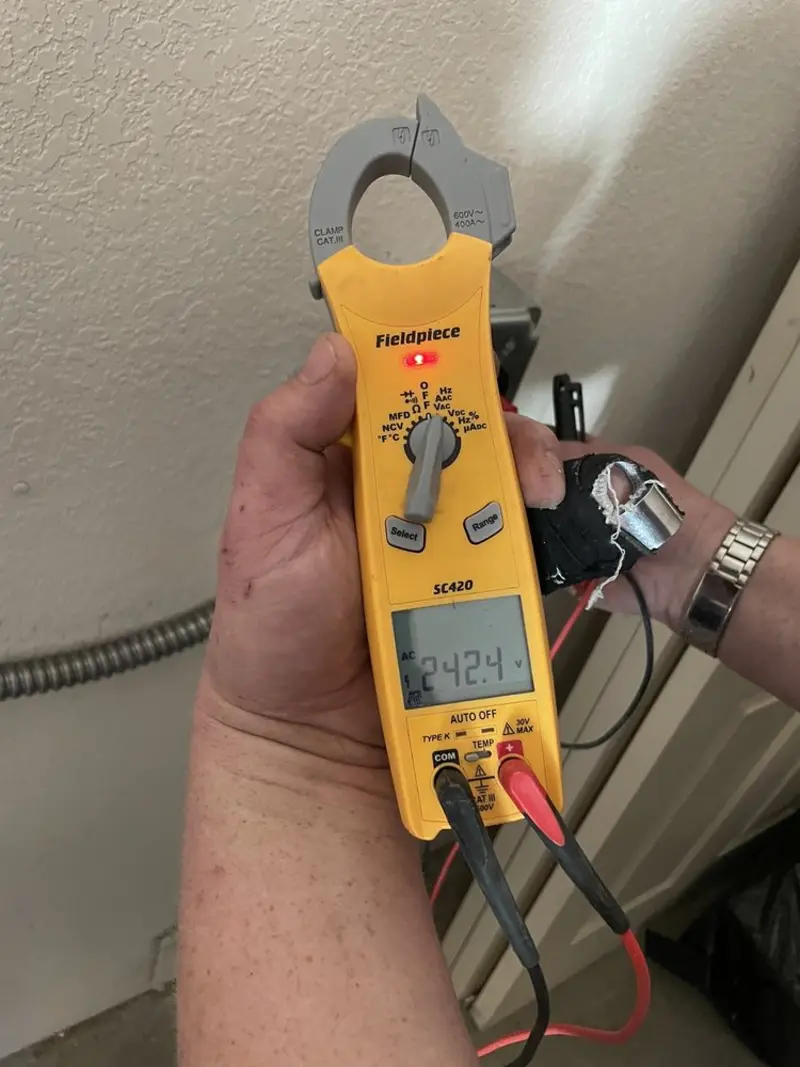 Voltage testing with clamp meter during Ceiling Fan Installation in Hatfield